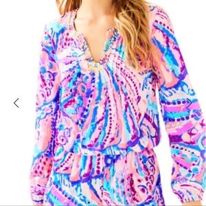 Lilly Pulitzer NWOT long sleeve romper size small. Never worn.